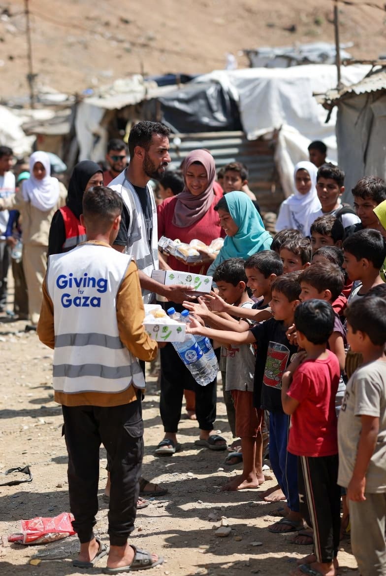 Giving for Gaza volunteers serving children
