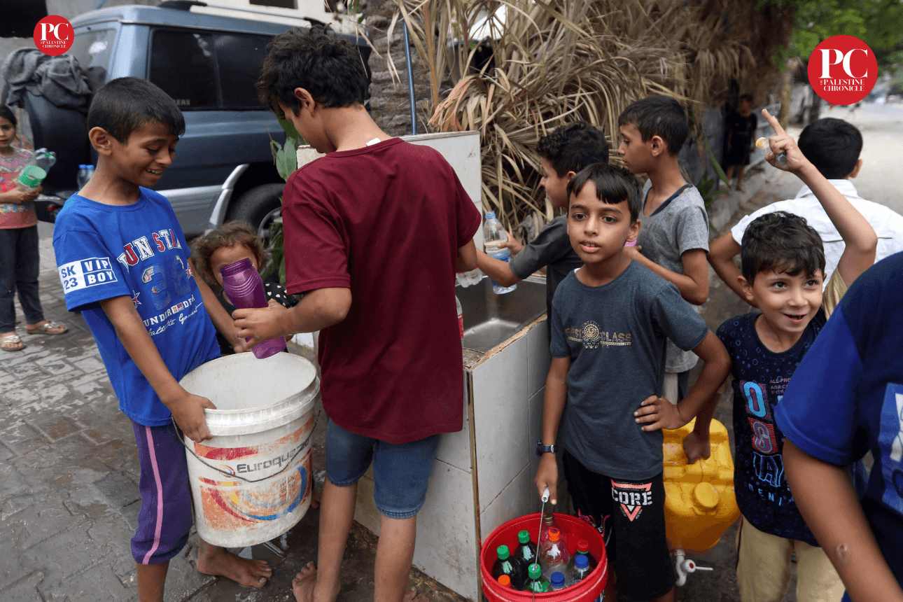 Community members filling clean water containers